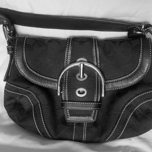 Coach logo buckle bag.
